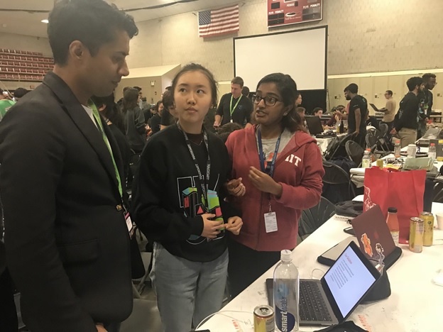 Chander Dhall judging students at MIT